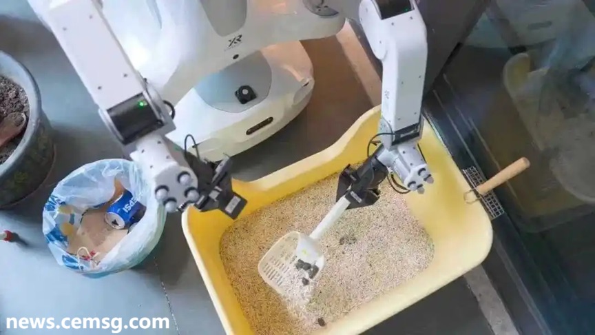 The robot is cleaning the litter box. The robot is cleaning the litter box.